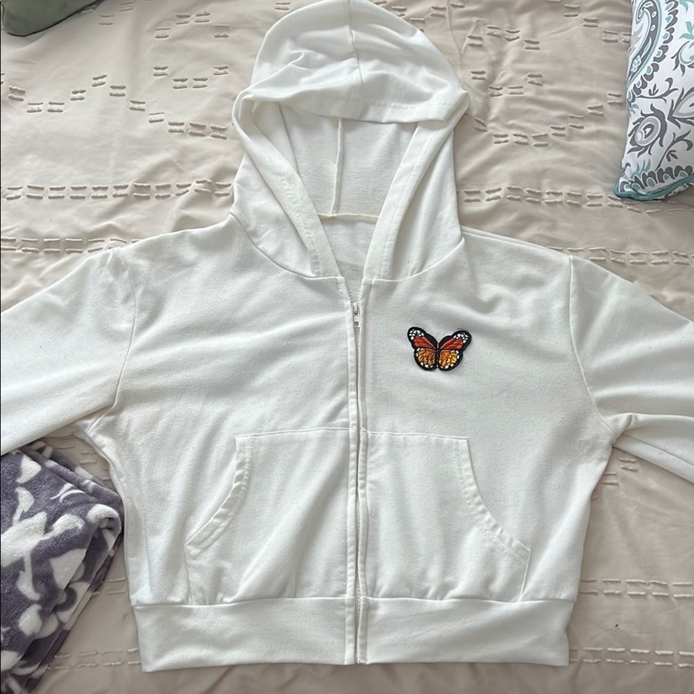 Cropped zip-up with butterfly patch